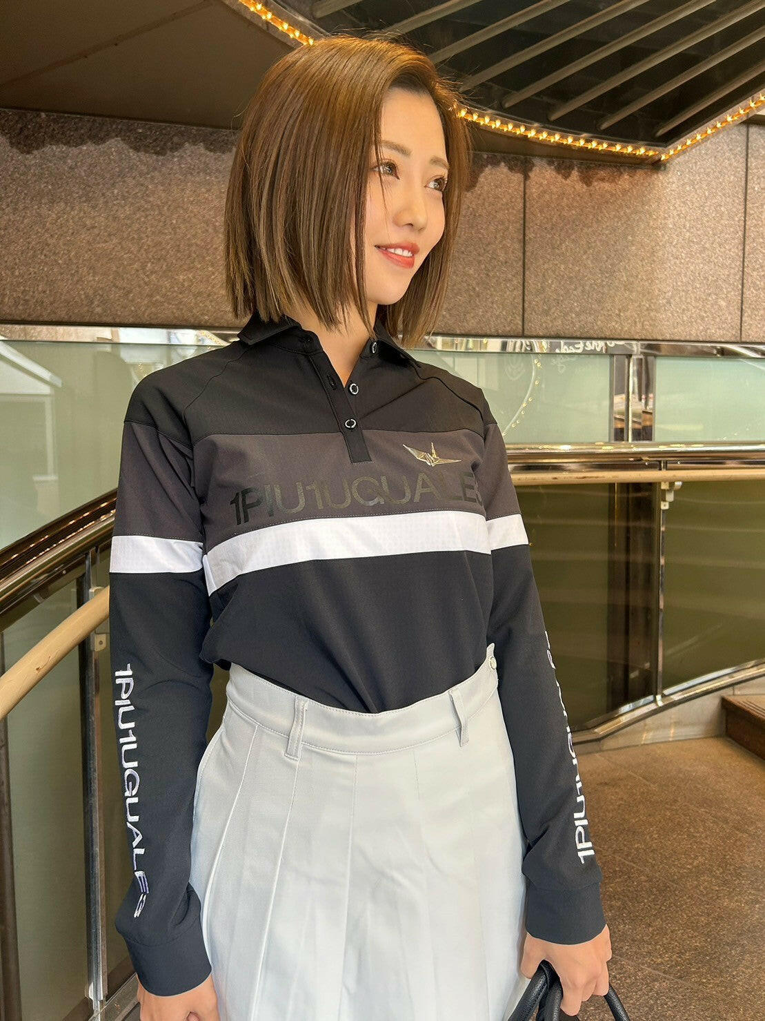 1PIU1UGUALE3 WOMENS L/S POLO SIDE SWITCH